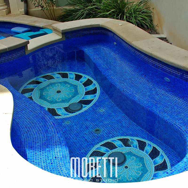 All glass tile pool with custom hand made design.