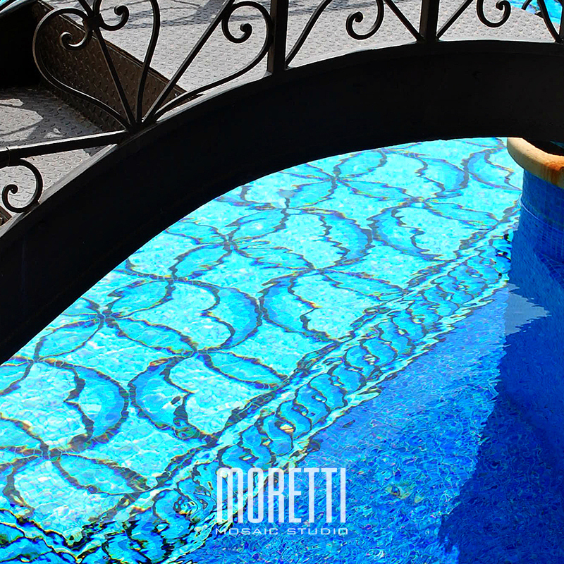 All glass tile pool with custom hand made design.