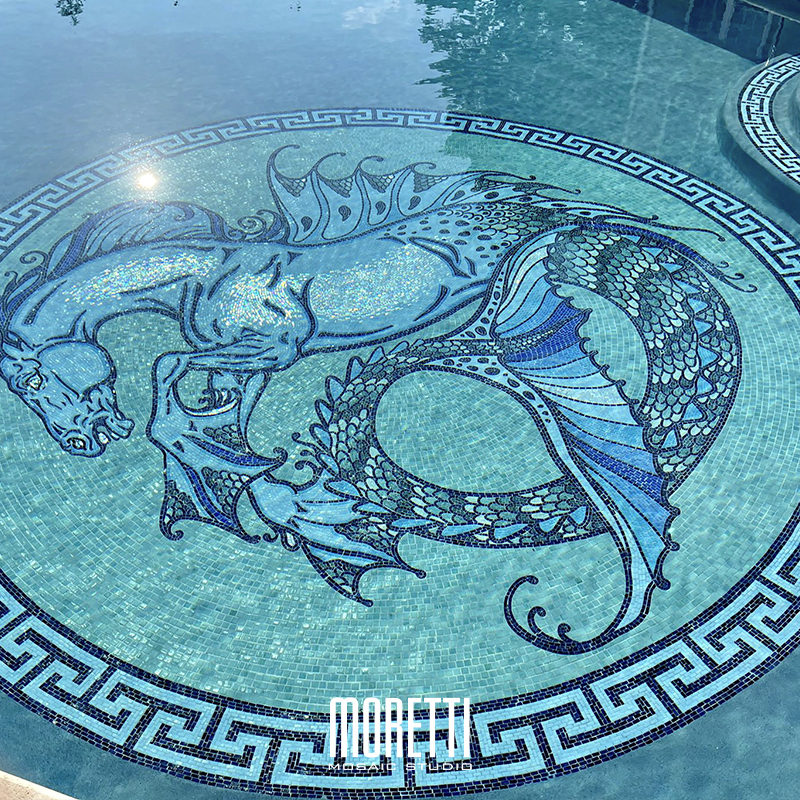 Custom handmade medallion inserted in plaster and custom Greek key waterline.